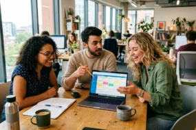 Content team collaborating in a modern office to scale their content production workflow