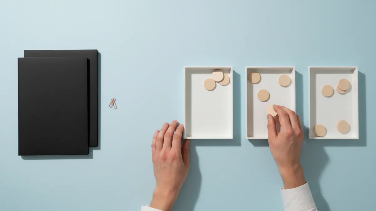 Hands move tokens through steps in a GPTZero vs ZeroGPT test method process.